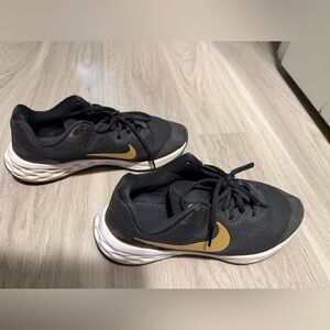 Nike Black and Gold Athletic Shoes
